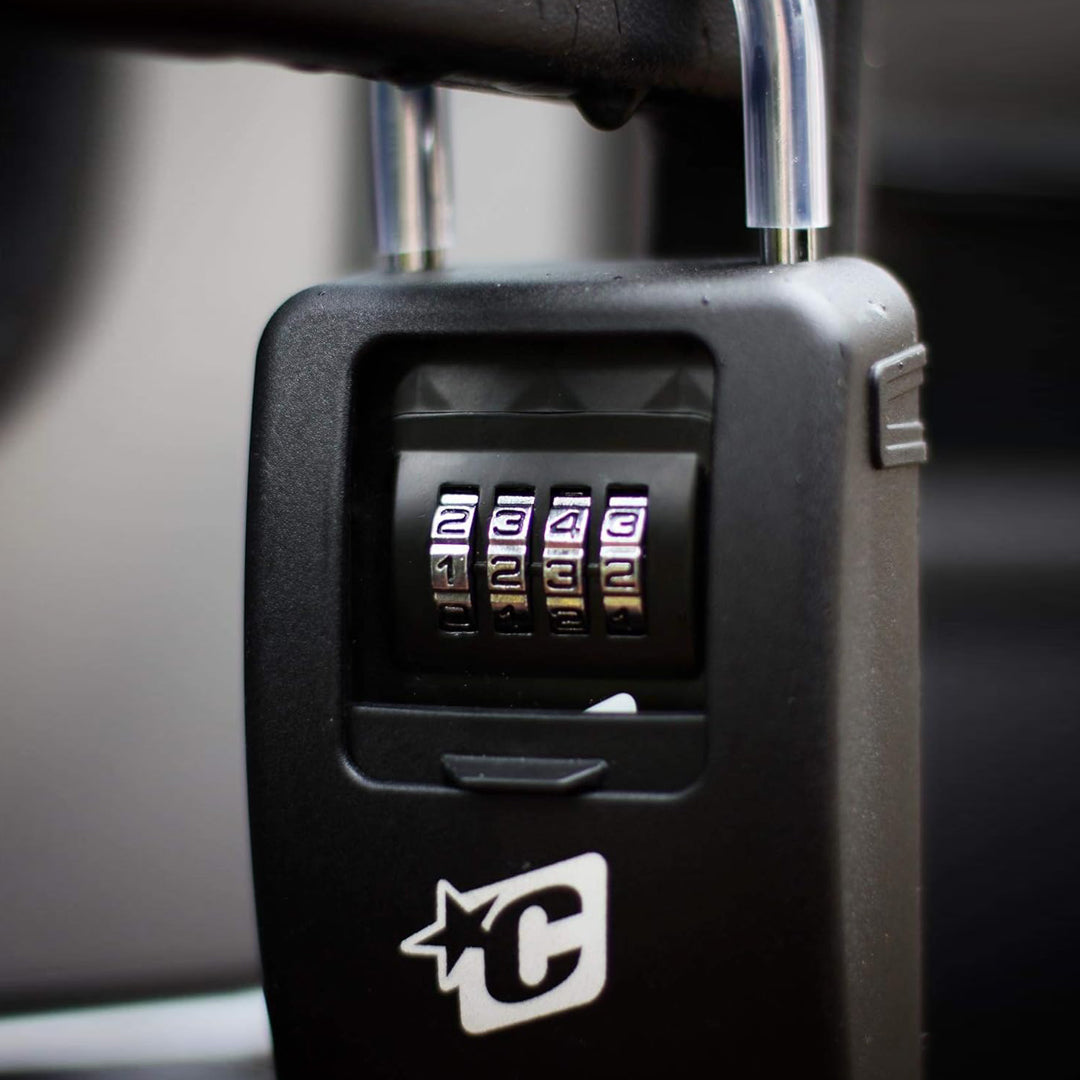Candado con compartimiento para llave de auto con combinación Creatures